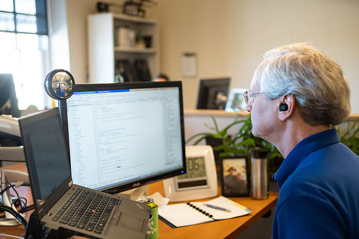 Caktus Developer Dan Poirier working at his desk