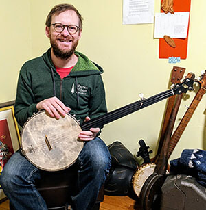 Dane Summers with his fretless banjo.